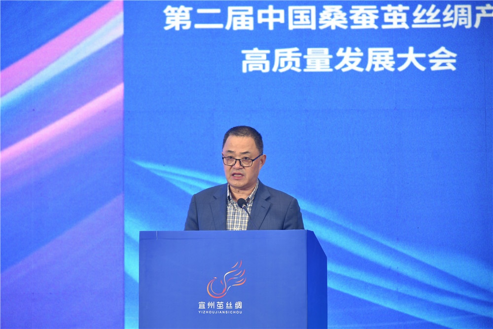周国建董事长在2022中国茧丝绸大会上讲话_J9集团新闻_新闻中心_J9集团丝绸，，，，金三塔丝绸_J9集团